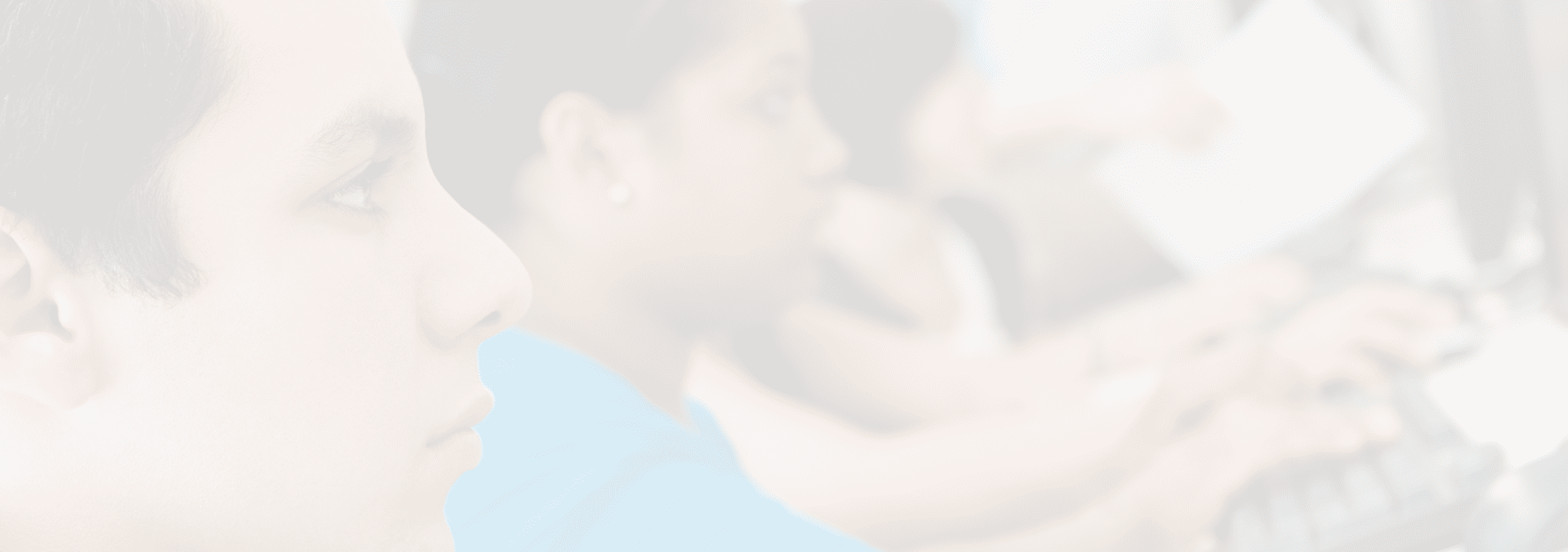Multiethnic students using computer with professor in lab